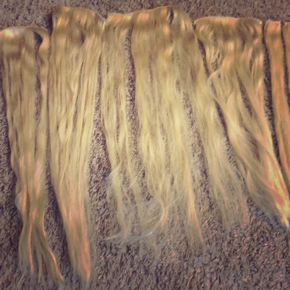 Bleach blonde Bellami clip in hair extensions